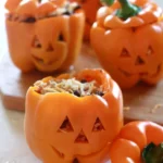 Shredded Chicken and Rice Stuffed Peppers served on a plate