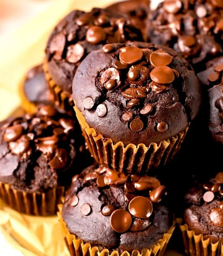 Delicious sweet potato chocolate muffins served on a plate, perfect for snacks.