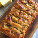 Deliciously baked loaf of banana bread on a wooden table