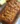 Deliciously baked loaf of banana bread on a wooden table