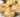 Three Cheese Stuffed Mushrooms appetizer topped with melted cheese and herbs