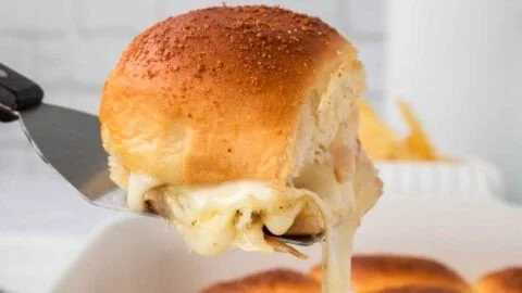 Turkey and Cheese Sliders served on a plate with fresh ingredients.