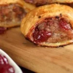 Turkey and cranberry sausage rolls on a platter