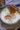 Creamy whipped feta with a drizzle of hot honey served in a bowl.