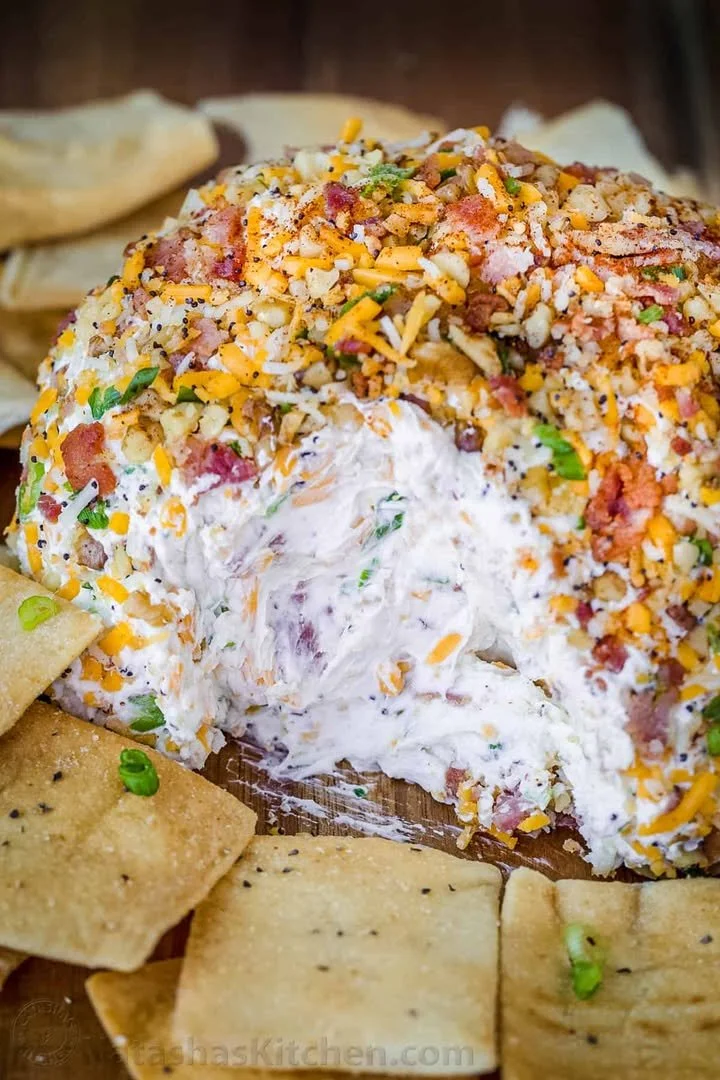 Delicious Bacon Ranch Cheese Ball served on a platter with crackers