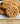 Deliciously baked easy peanut butter cookies on a cooling rack.