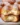 Delicious bomboloni, Italian cream-filled donuts, dusted with sugar