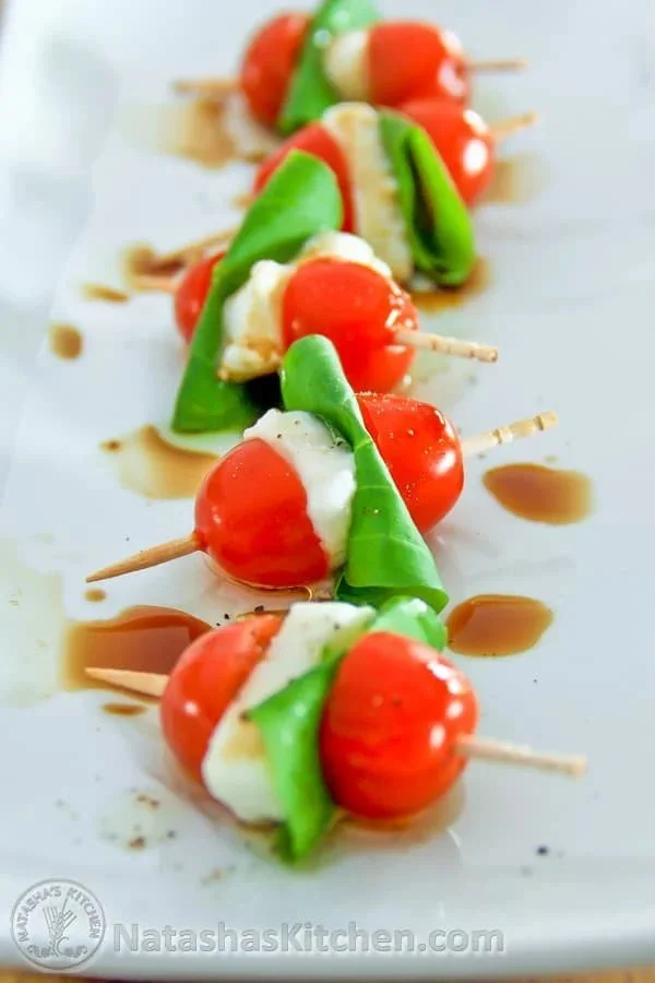 Delicious Caprese Skewers with cherry tomatoes, mozzarella, and fresh basil
