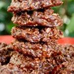 Delicious chocolate oatmeal no-bake cookies stacked on a plate