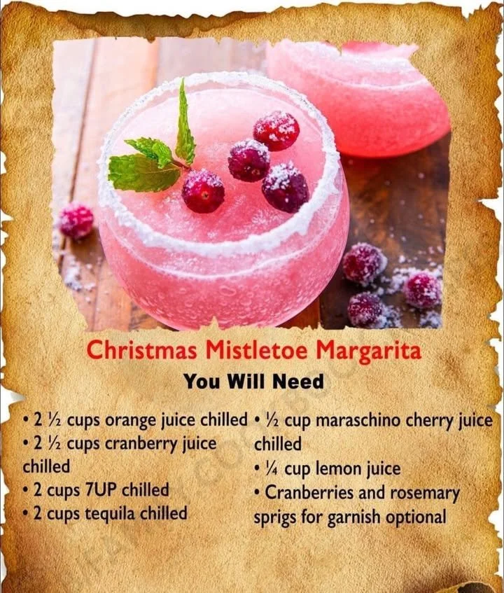 Large batch Christmas mistletoe margarita ready for serving in festive glasses