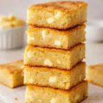 Delicious vanilla brownies topped with creamy white chocolate.