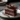 Delicious double-layer chocolate cake topped with creamy frosting