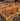 Delicious easy pecan pie bars topped with pecans and caramel