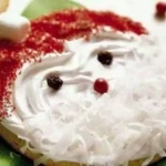 Plate of easy Santa cookies decorated for Christmas