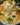 A delicious serving of Grandma's casserole topped with cheese and herbs