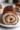 Freshly baked irresistible chocolate swirl roll with rich chocolate filling