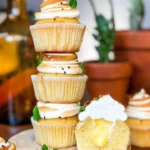 Delicious Lemon Meringue Muffins with a fluffy meringue topping