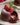 Molten chocolate lava cake with raspberries served on a plate
