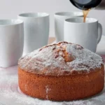 One-bowl vanilla cake topped with frosting ready to serve