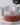 One-bowl vanilla cake topped with frosting ready to serve