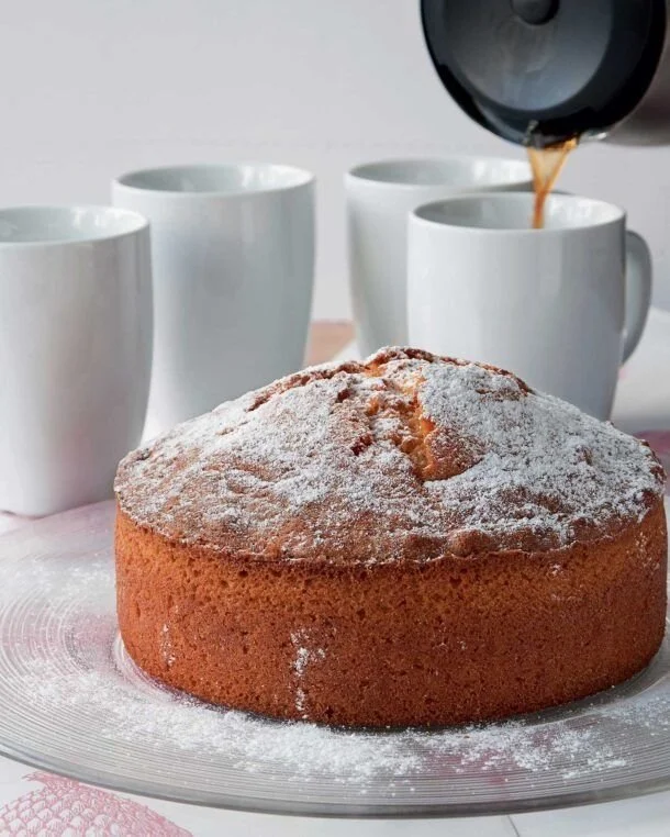 One-bowl vanilla cake topped with frosting ready to serve