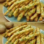 Golden crispy potato sticks served in a bowl, perfect for snacking.