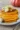 Fluffy pumpkin pancakes stacked with maple syrup and fall spices