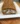 Homemade Pumpkin Roll Cake with cream cheese filling on a serving plate.