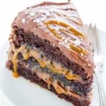 Delicious salted caramel chocolate cake topped with caramel drizzle and sea salt