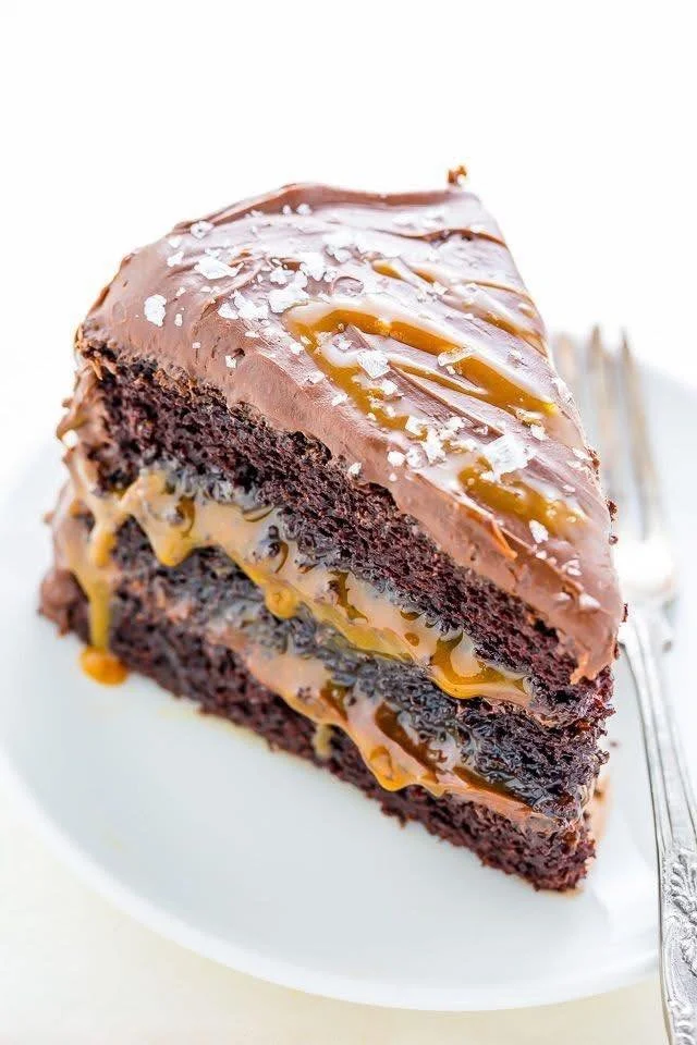 Delicious salted caramel chocolate cake topped with caramel drizzle and sea salt