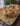 Creamy Seafood Macaroni with Colby Jack Cheese served in a bowl