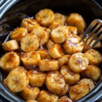 Delicious slow cooker banana foster pudding with five simple ingredients.