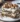 Delicious S'mores Lasagna with layers of chocolate, marshmallow, and graham crackers