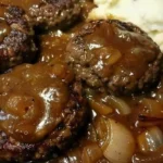 Delicious smothered hamburger steak topped with savory gravy