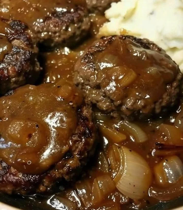 Delicious smothered hamburger steak topped with savory gravy