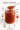 A jar of homemade spicy chutney showcasing its vibrant color and texture