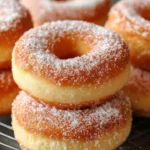 Delicious sugar donuts dusted with powdered sugar