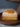 Delicious sweet orange-cinnamon square dessert on a white plate